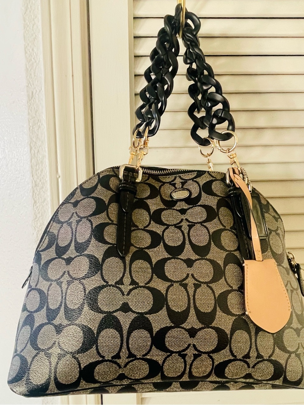 Elegant Coach Black Monogram Peyton Dome Satchel with chain handle.